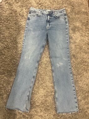 Zara Light Wash Flare Jeans in Faded Blue
